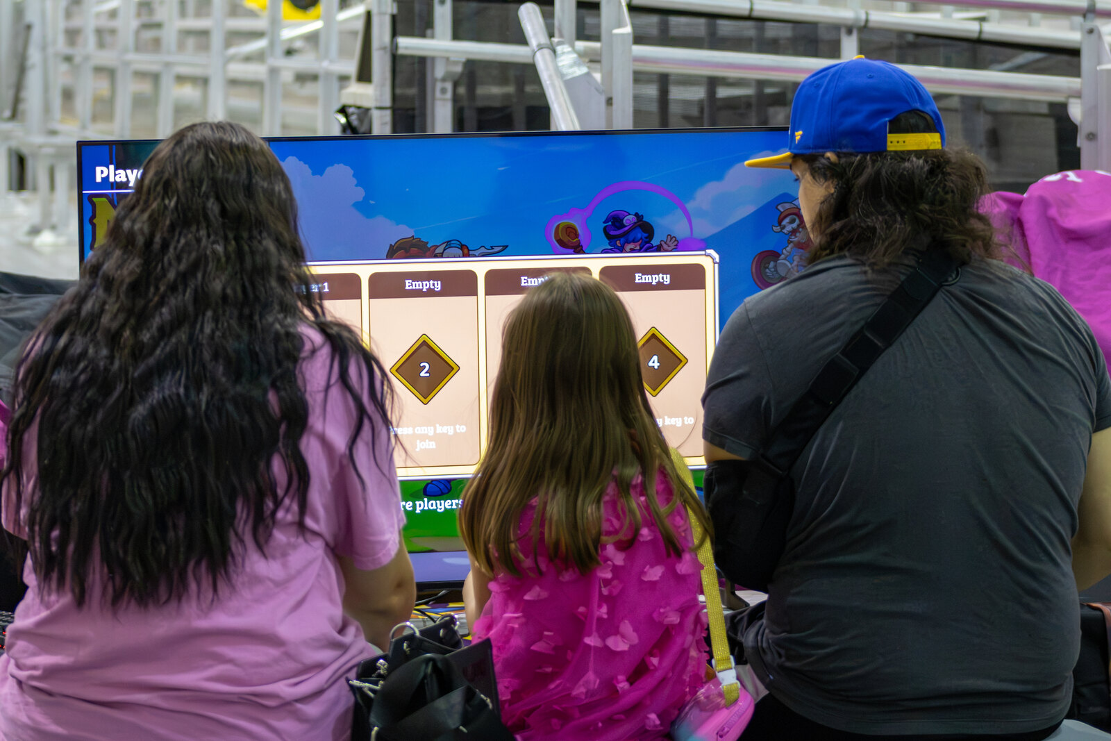 Fans playing games in an AGZ-supported gaming zone at Garden State Comic Fest